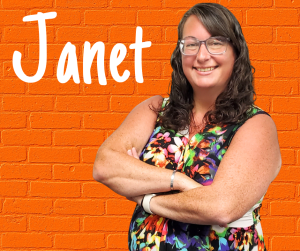 Finger Lakes Independence Center Janet Goodrich Finger Lakes Independence Center Janet Goodrich in front of a orange brick wall with first name in white letters