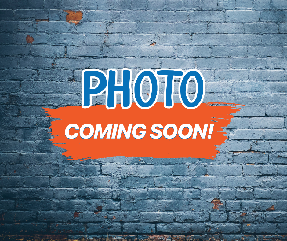 blue brick wall photo in blue letters with white outline coming soon in white letters with orange background